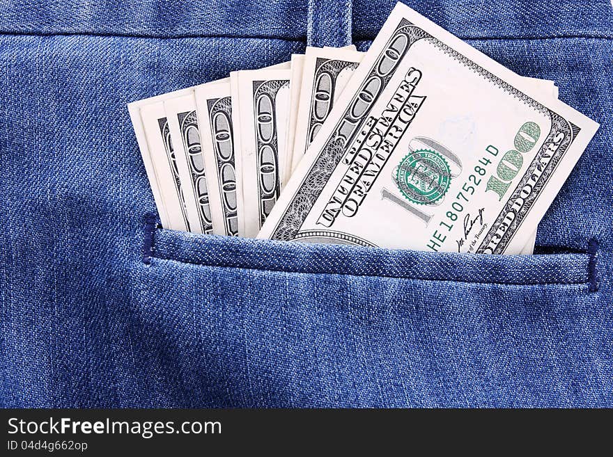 Money in jeans pocket, shopping background. Money in jeans pocket, shopping background