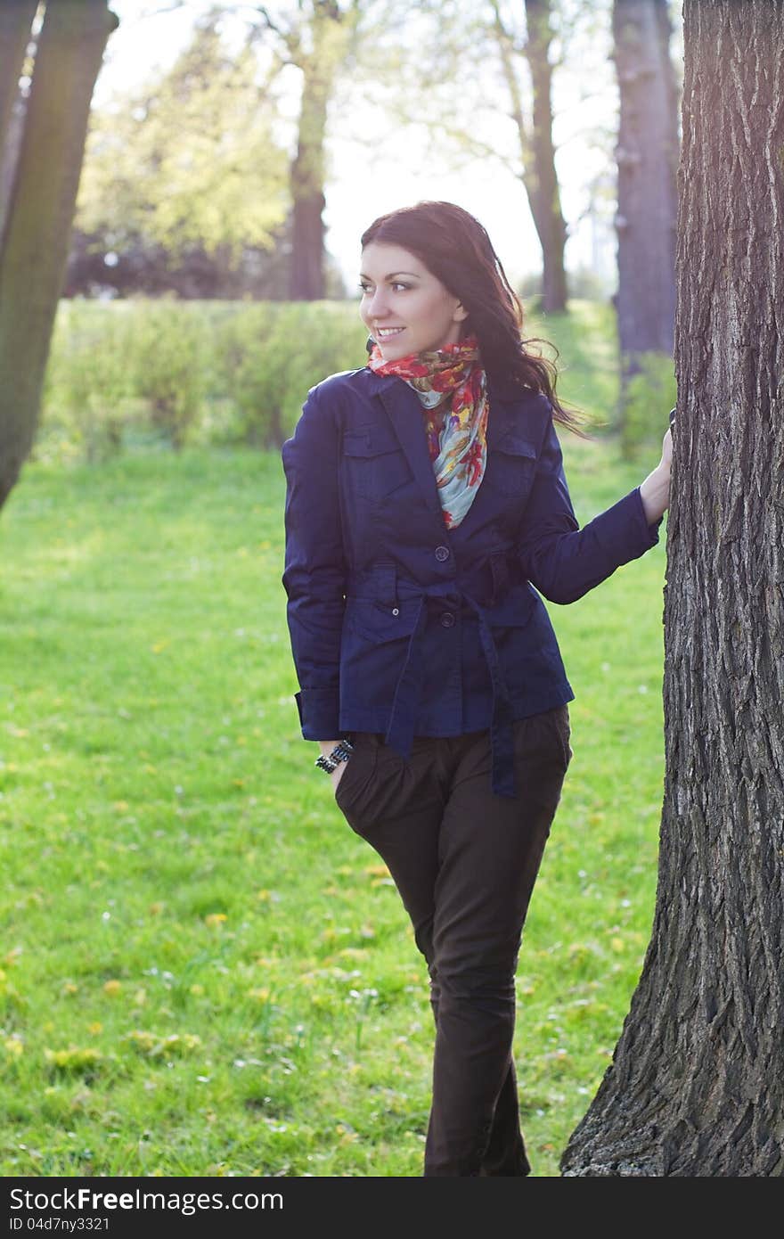 Beautiful Young Girl Near Tree