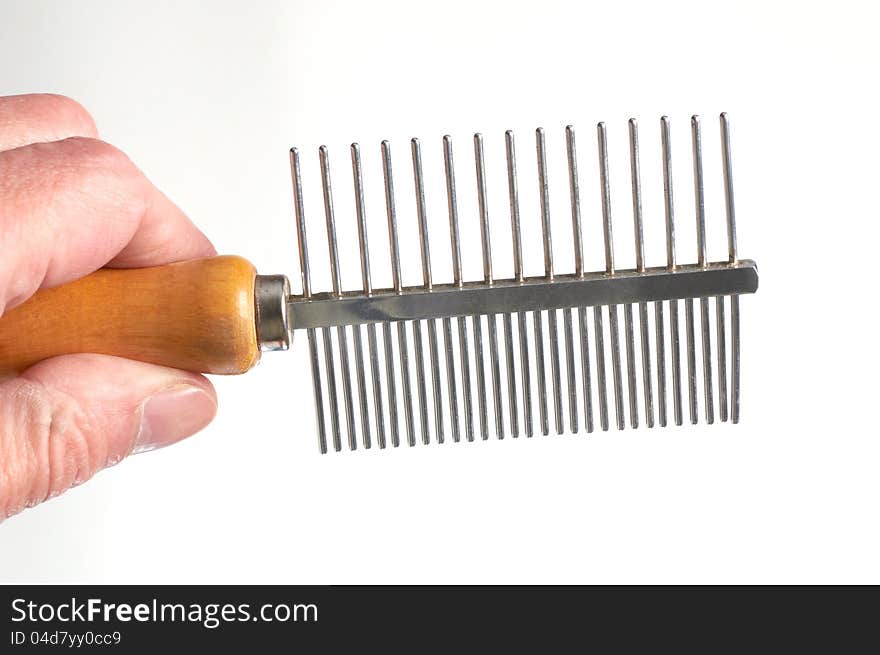 Hairbrush for animals in a hand