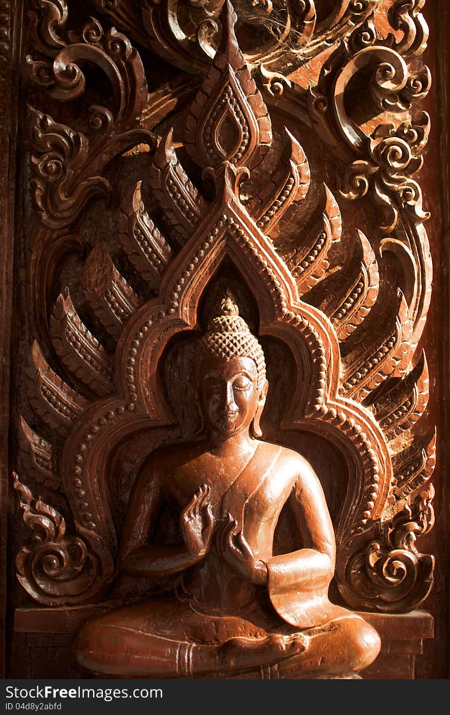 Thai traditional wood crave buddha image in temple