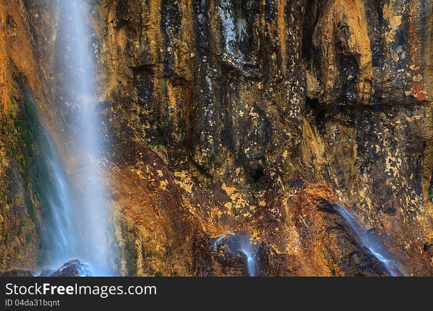 Peacefully flowing stream and waterfalls