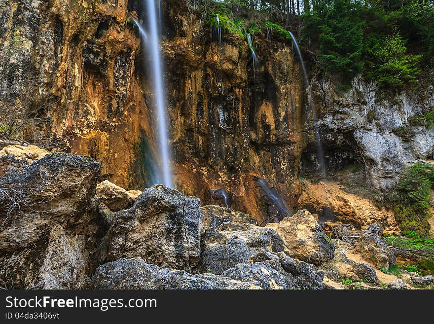 Peacefully flowing stream and waterfalls