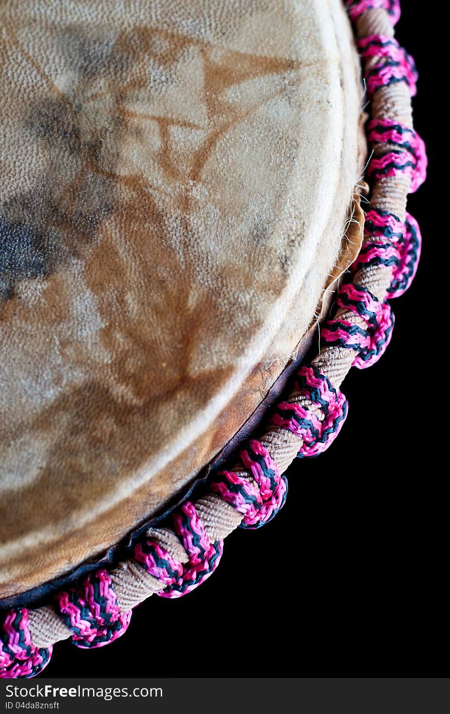 Close up of the djembe isolated on black background. Close up of the djembe isolated on black background