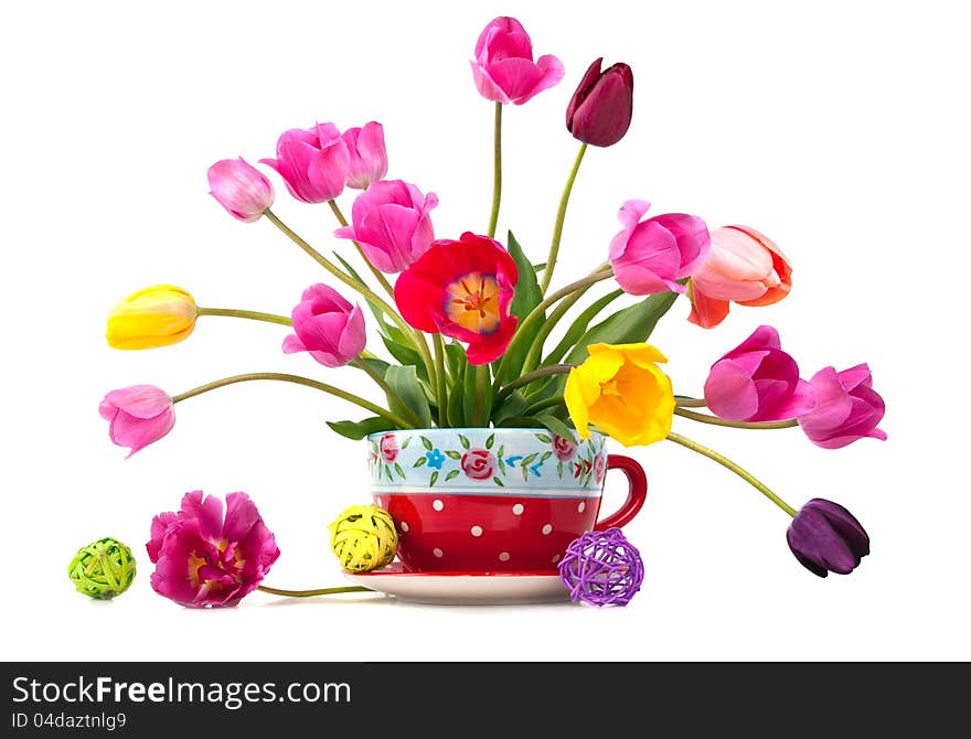 Beautiful bouquet of tulips in a red cup. Beautiful bouquet of tulips in a red cup