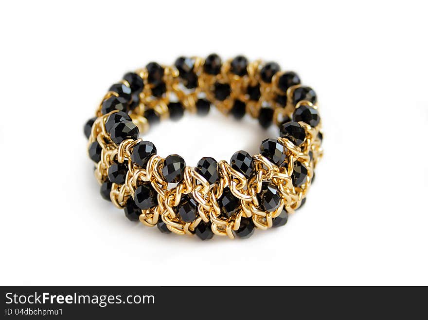 Beautiful Golden Bracelet With Black Stone On Isol