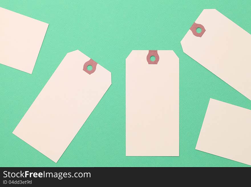 Blank tag on green paper background