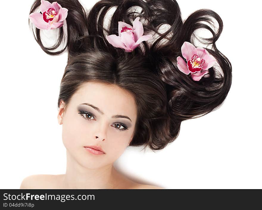 Girl With Floral Arrangement On Her Hair