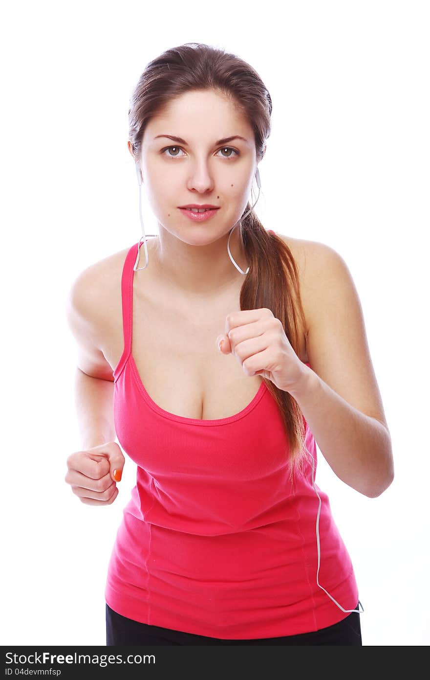 Running girl with headphones over white background