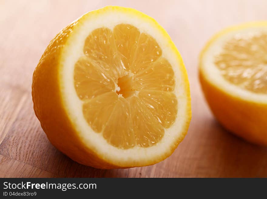 Close up of fresh lemons on wooden board