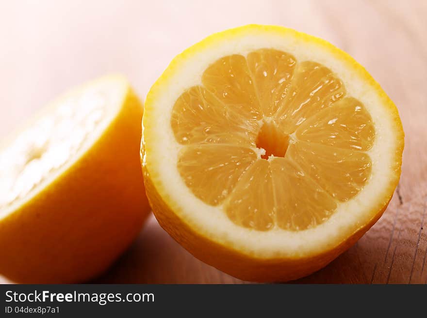 Fresh Lemons On Wooden Board