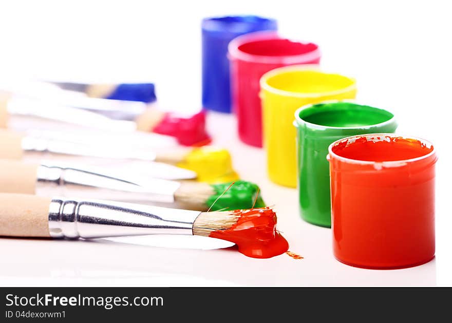 Close up of cans with colorful paint