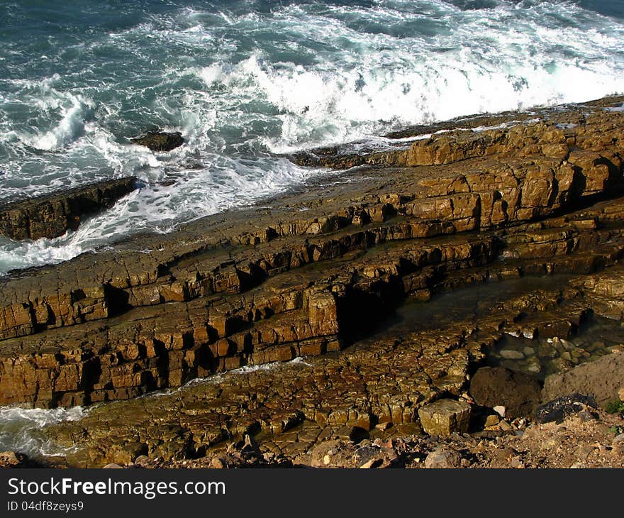 Sea scenery with a rock