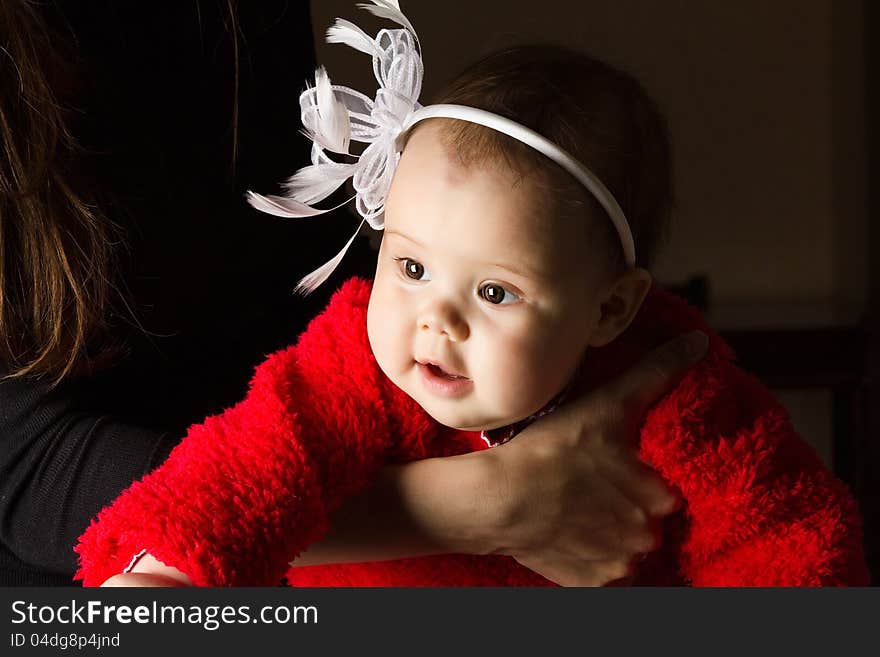 Child in the arms of mother. Child in the arms of mother