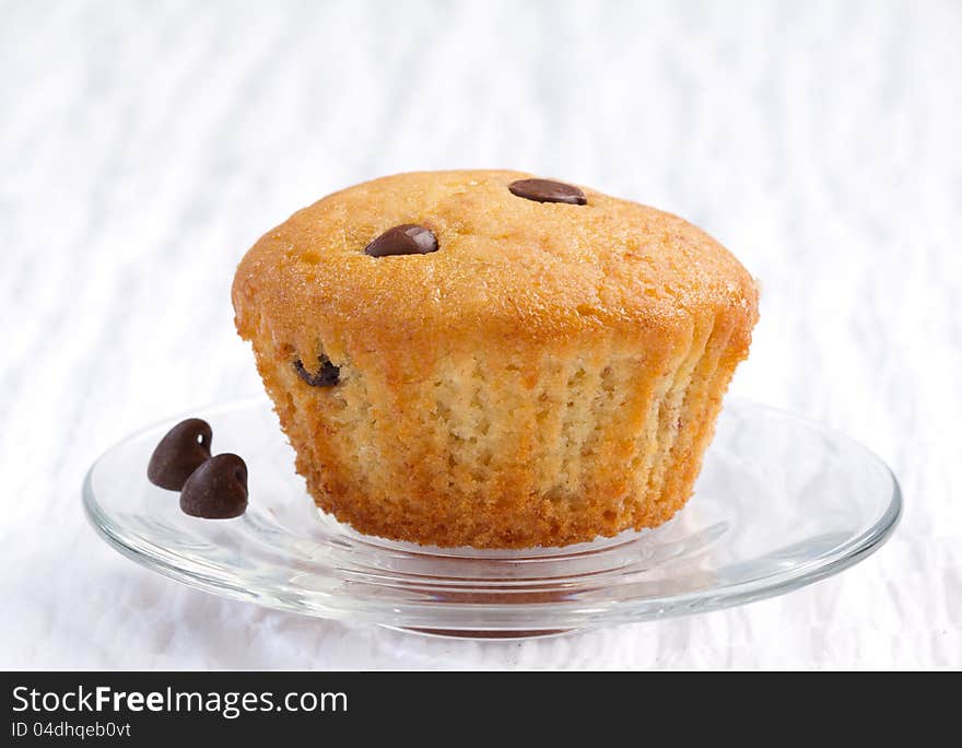 Banana chocolate ship cupcake display on white and clean background