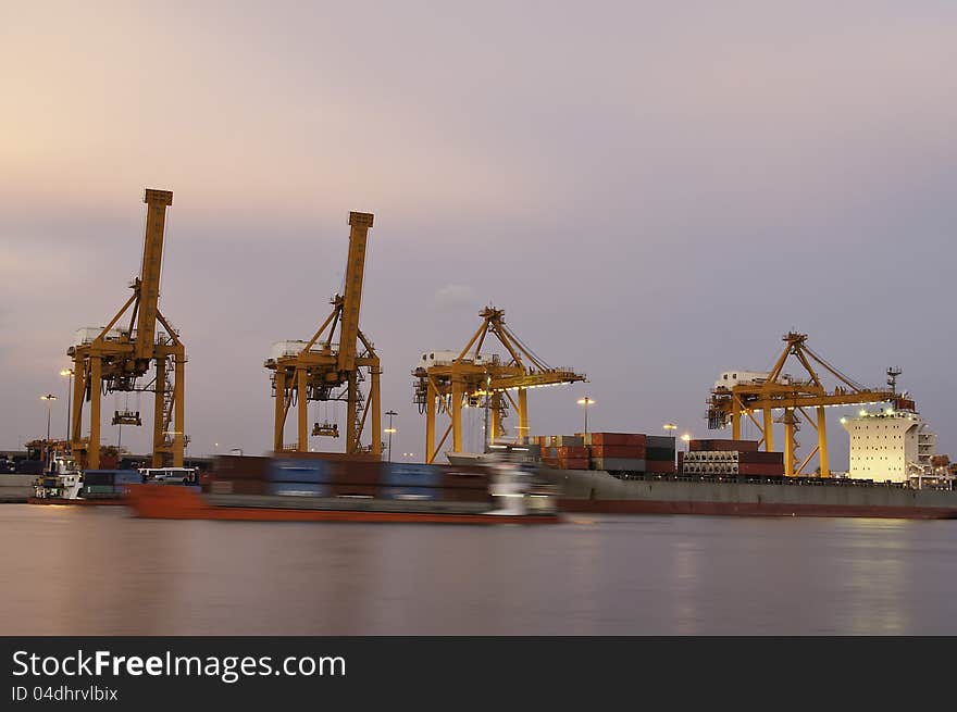 Harbour cranes in the colorful scene. Harbour cranes in the colorful scene