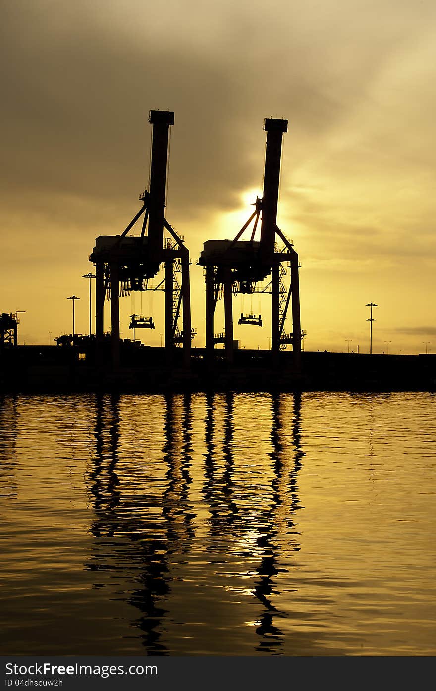 Harbour cranes in the morning sky