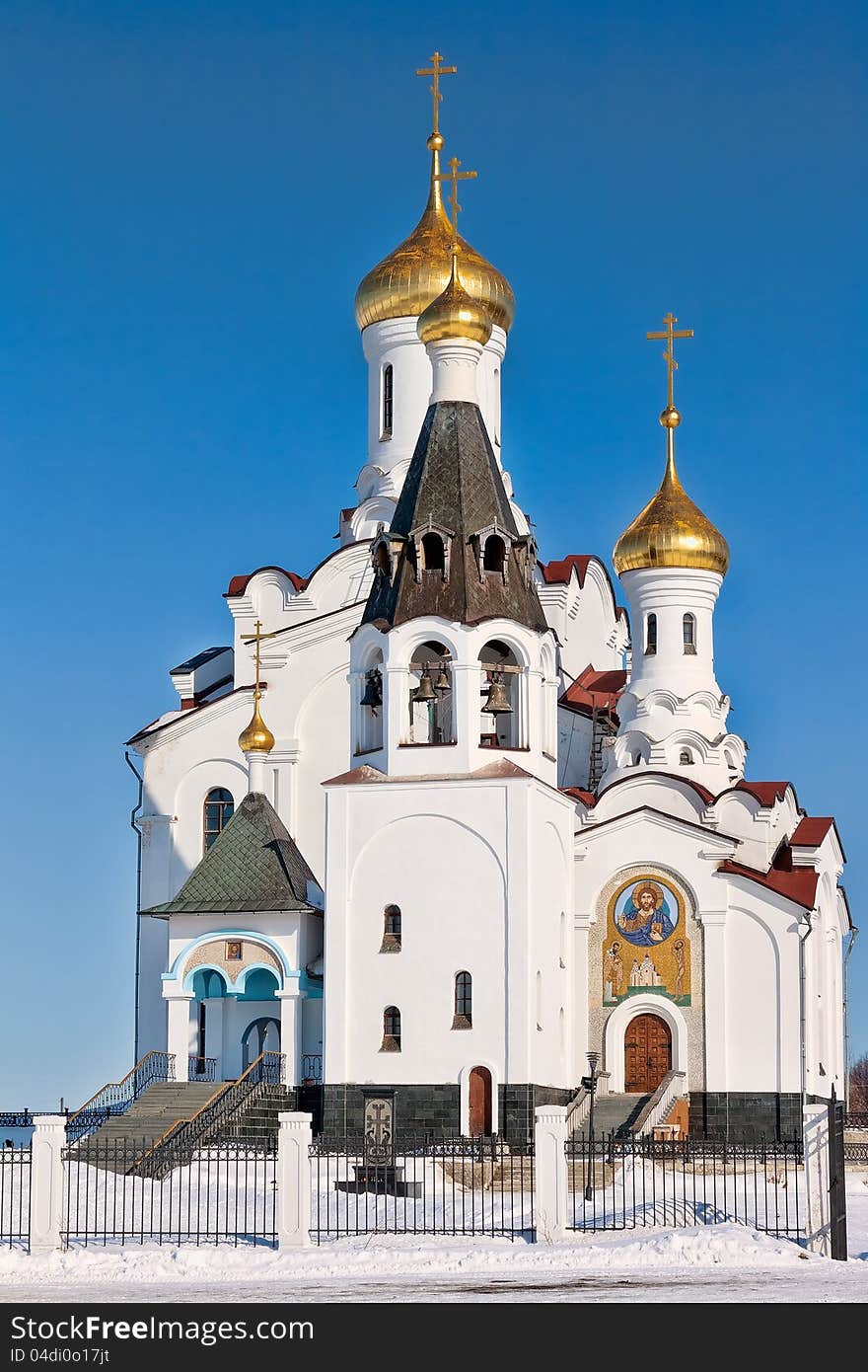 Domes of the Russian Orthodox church against the blue sky background. Domes of the Russian Orthodox church against the blue sky background