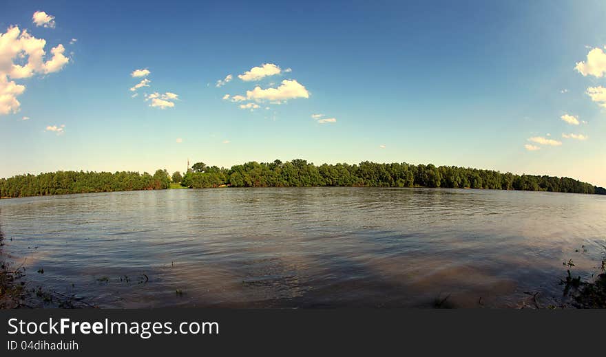 Landscape about the Danube near Leanyfalu, Hungary. Photo was taken with fisheye lens. Trees are on the other side of the river. Landscape about the Danube near Leanyfalu, Hungary. Photo was taken with fisheye lens. Trees are on the other side of the river.