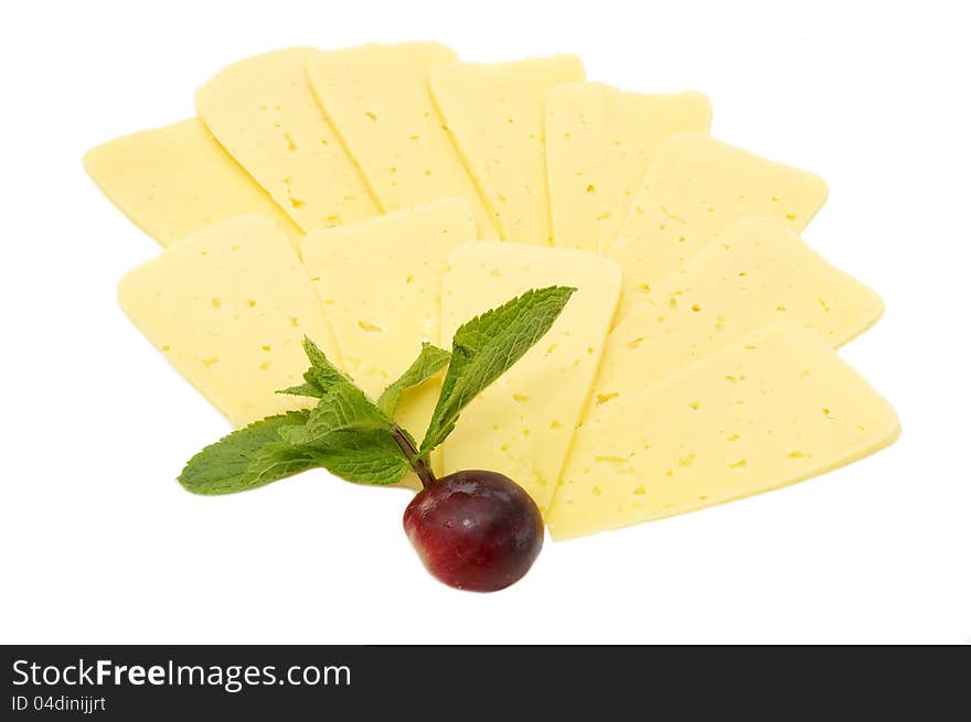 Cheese on a white background decorated with radish and mint