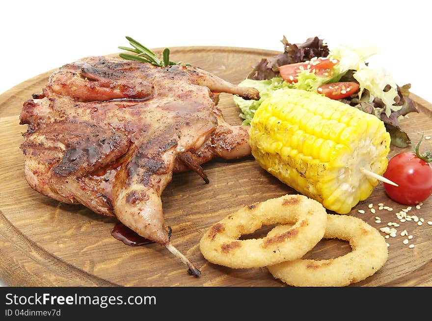 A Plate Of Roasted Quail