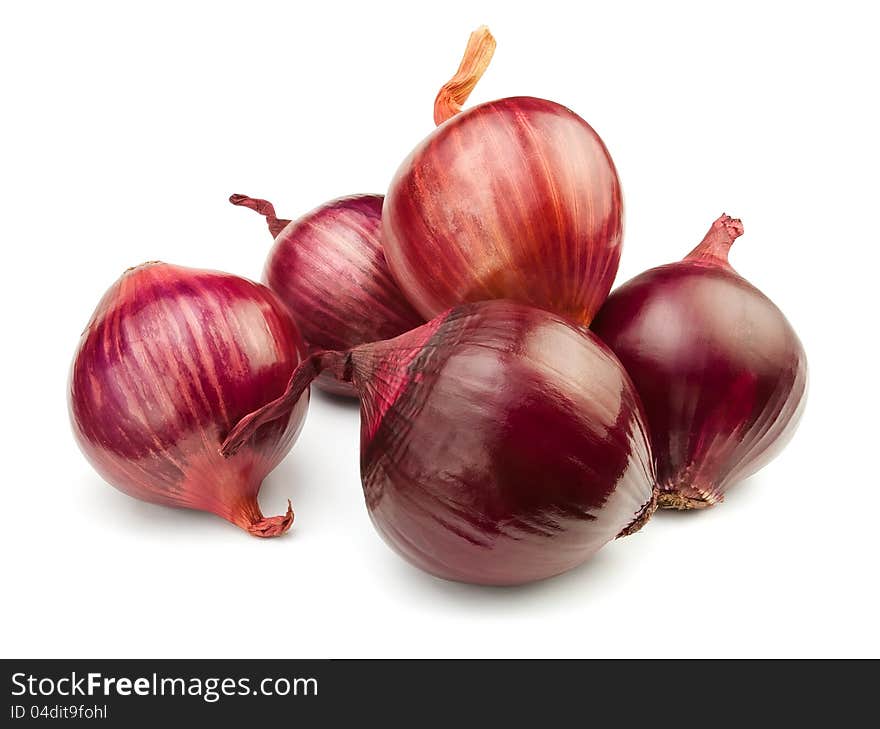 Five red onions against white background