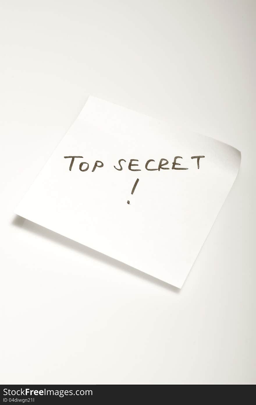 Top secret printed post-it note. Top secret printed post-it note