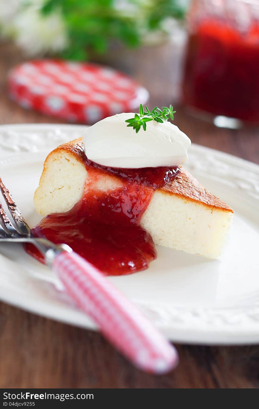 Cottage cheese cake with strawberry jam, selective focus