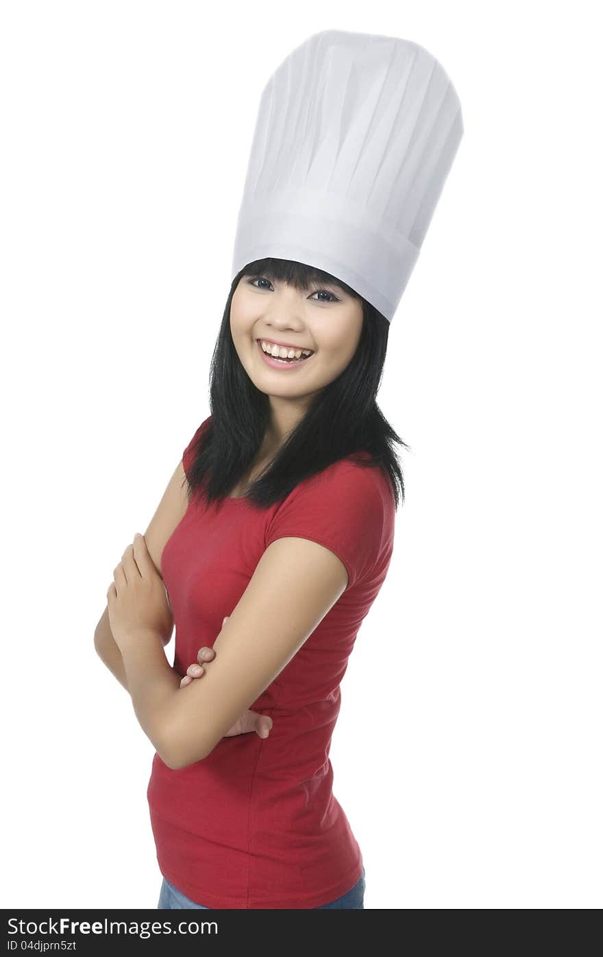 Beautiful asian young chef isolated over white background