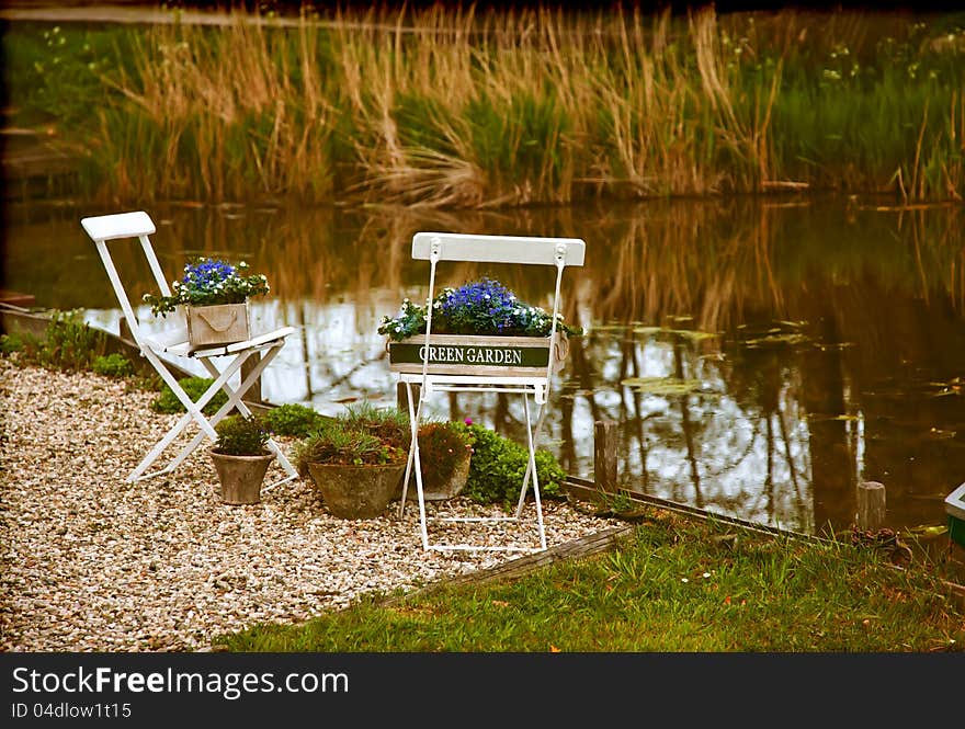 Traditional garden in retro style by river. Traditional garden in retro style by river