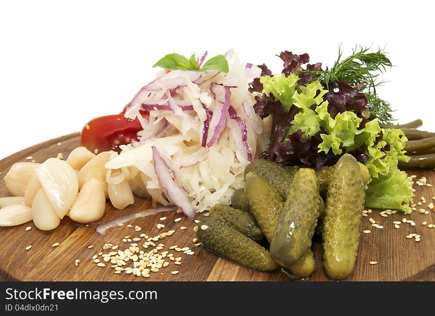 Meats at the restaurant on a wooden plate