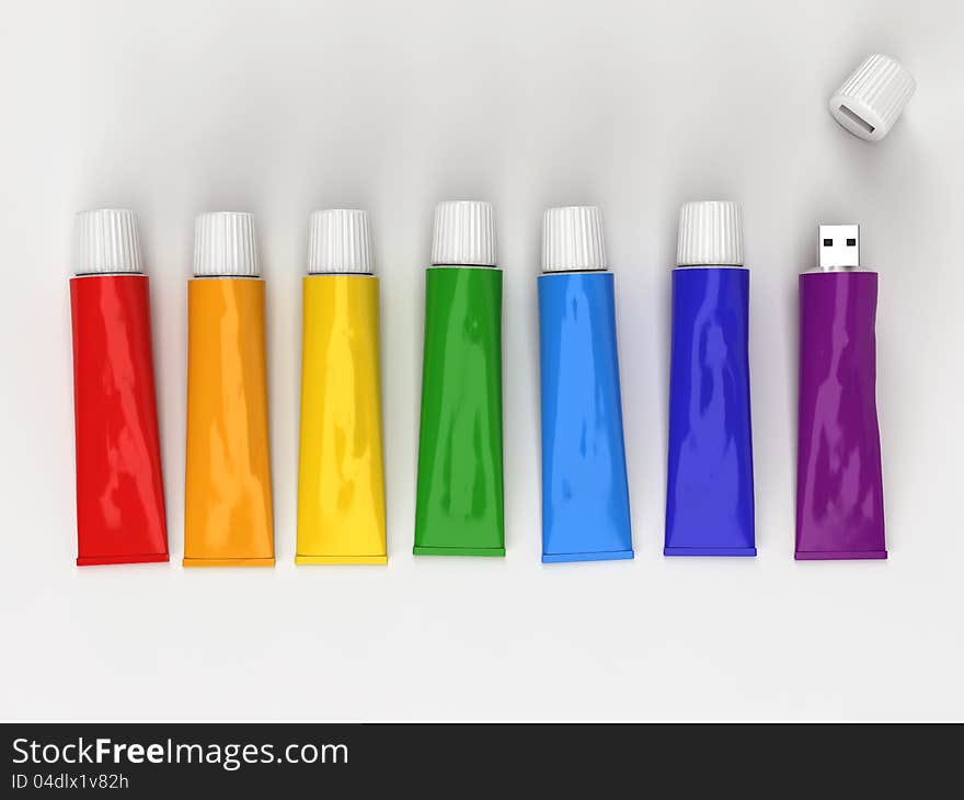 Tubes of paint on a white background in a flash