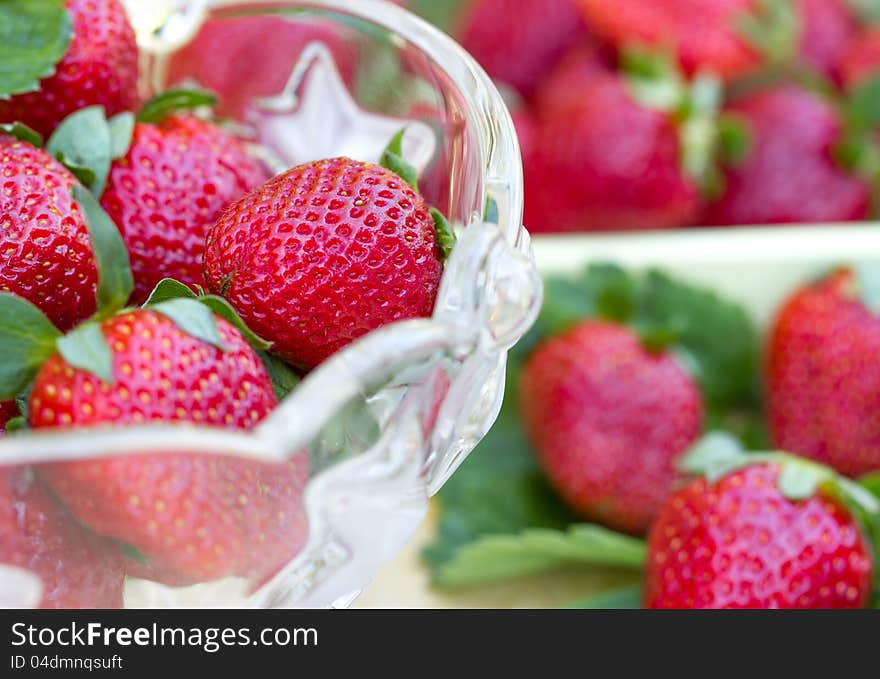 Fresh strawberries in glass bowl