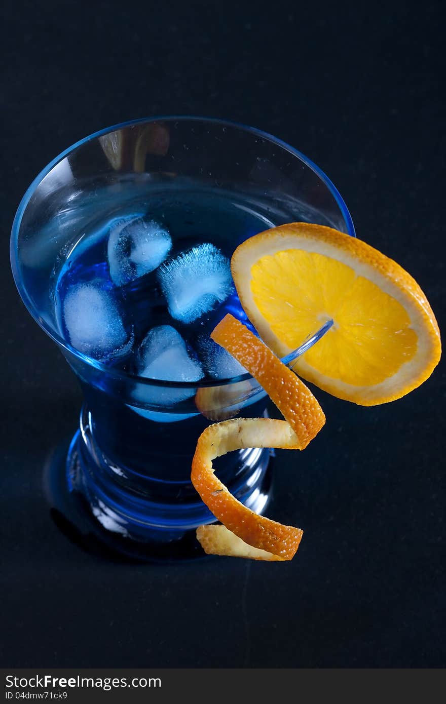 Blue curacao cocktail on black background. Blue curacao cocktail on black background