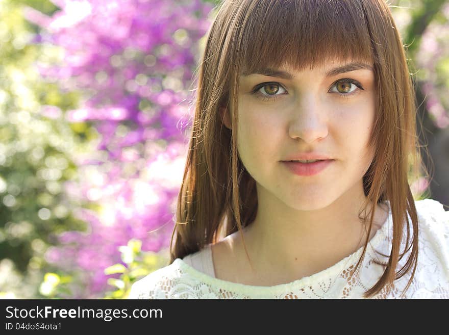 Beautiful girl in a spring garden. Beautiful girl in a spring garden