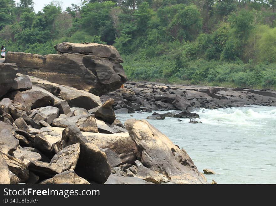 The traces of the river eroded the rock into a beautiful trail along the banks of the Mekong River between Thailand and Laos. The traces of the river eroded the rock into a beautiful trail along the banks of the Mekong River between Thailand and Laos.