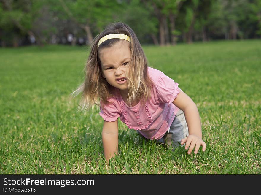 Girl Shows A Wild Animal In The Park