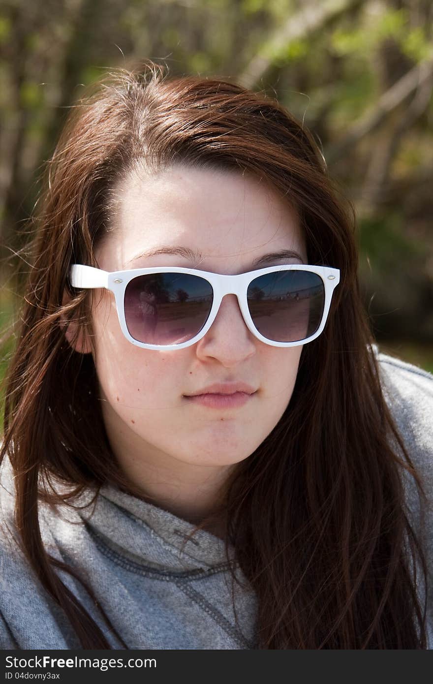 Teen girl in sunglasses