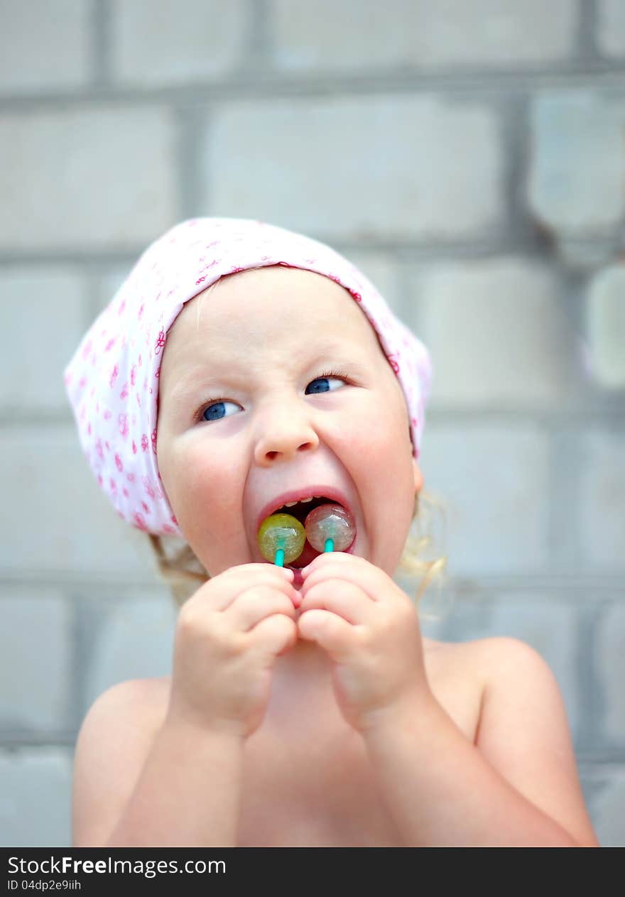 Child loves sweets incredibly outdoor. Child loves sweets incredibly outdoor