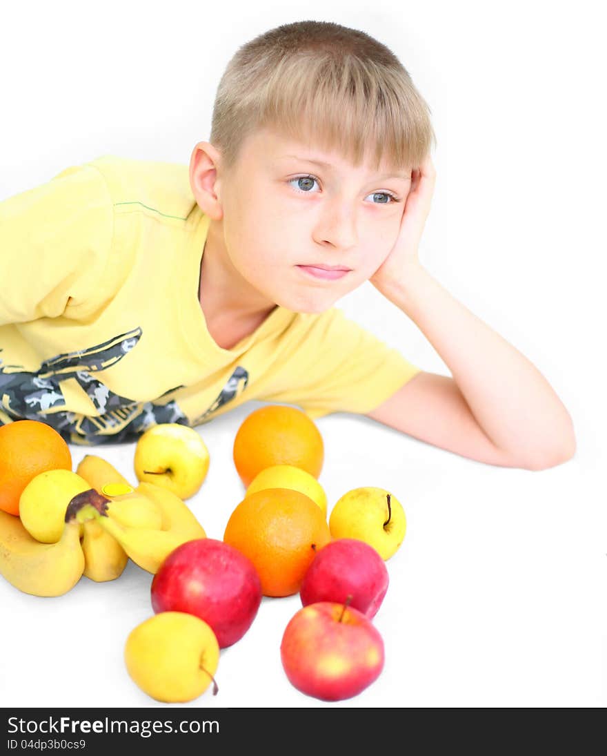 Boy with fruit an isolated background