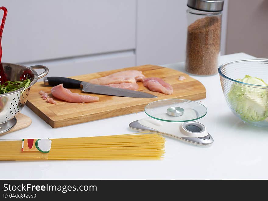 Scales on the table with other kitchen stuff