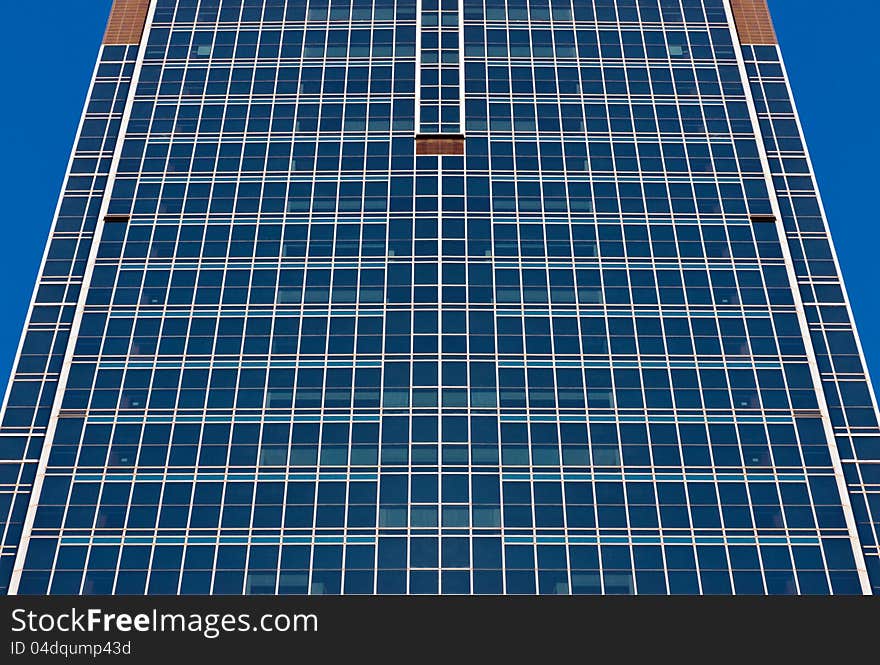 Office building on a blue sky background. Office building on a blue sky background