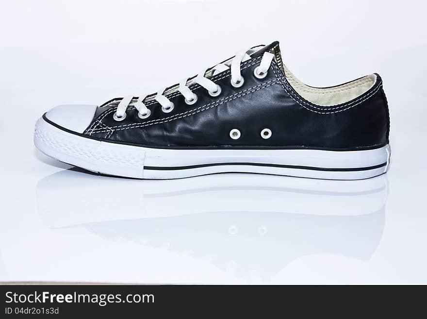 Black Leather Sneaker On White Background