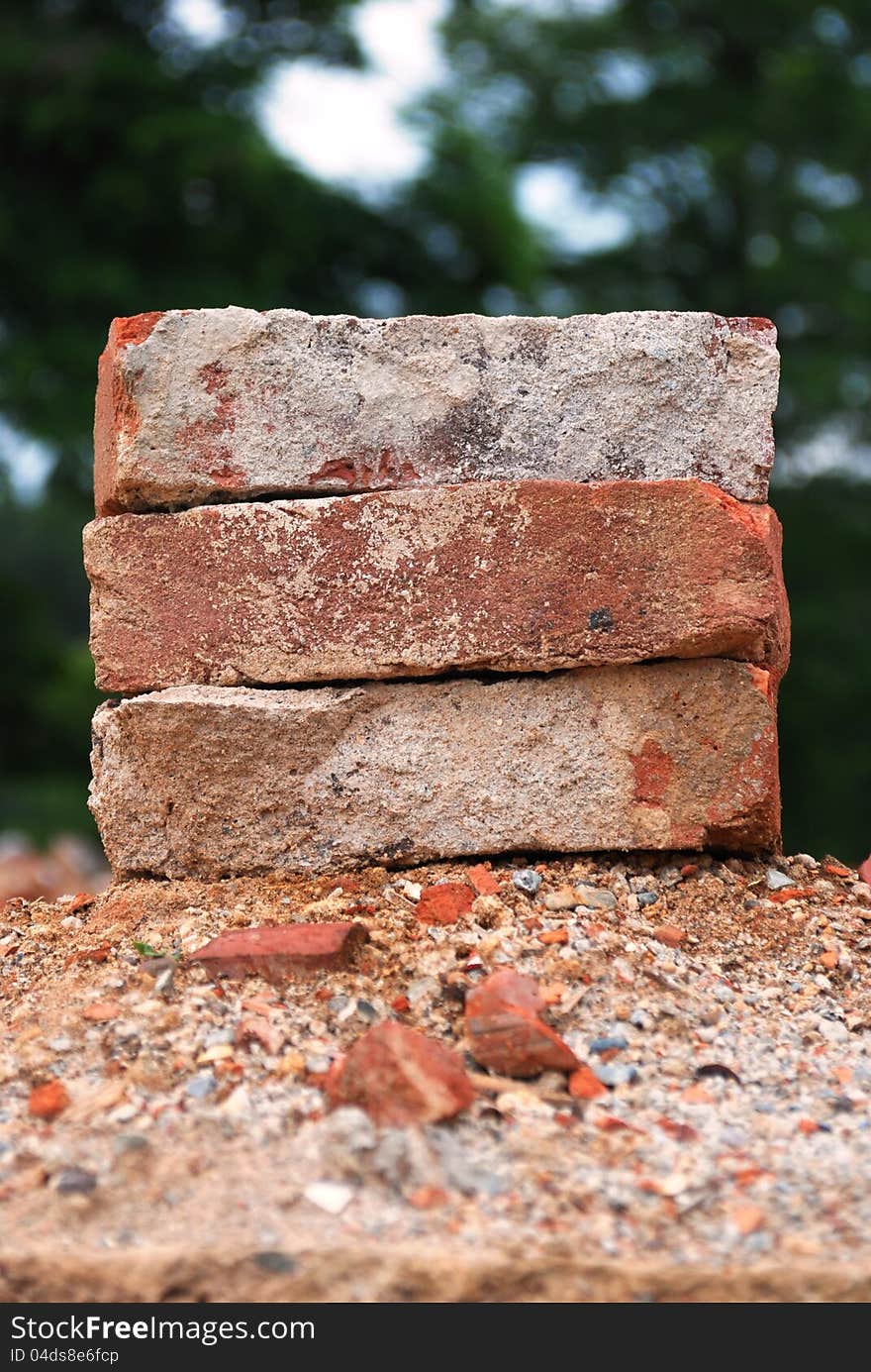 Three used bricks