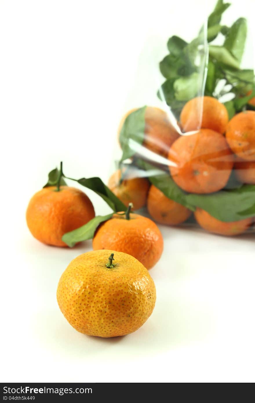 Orange fruit on white background