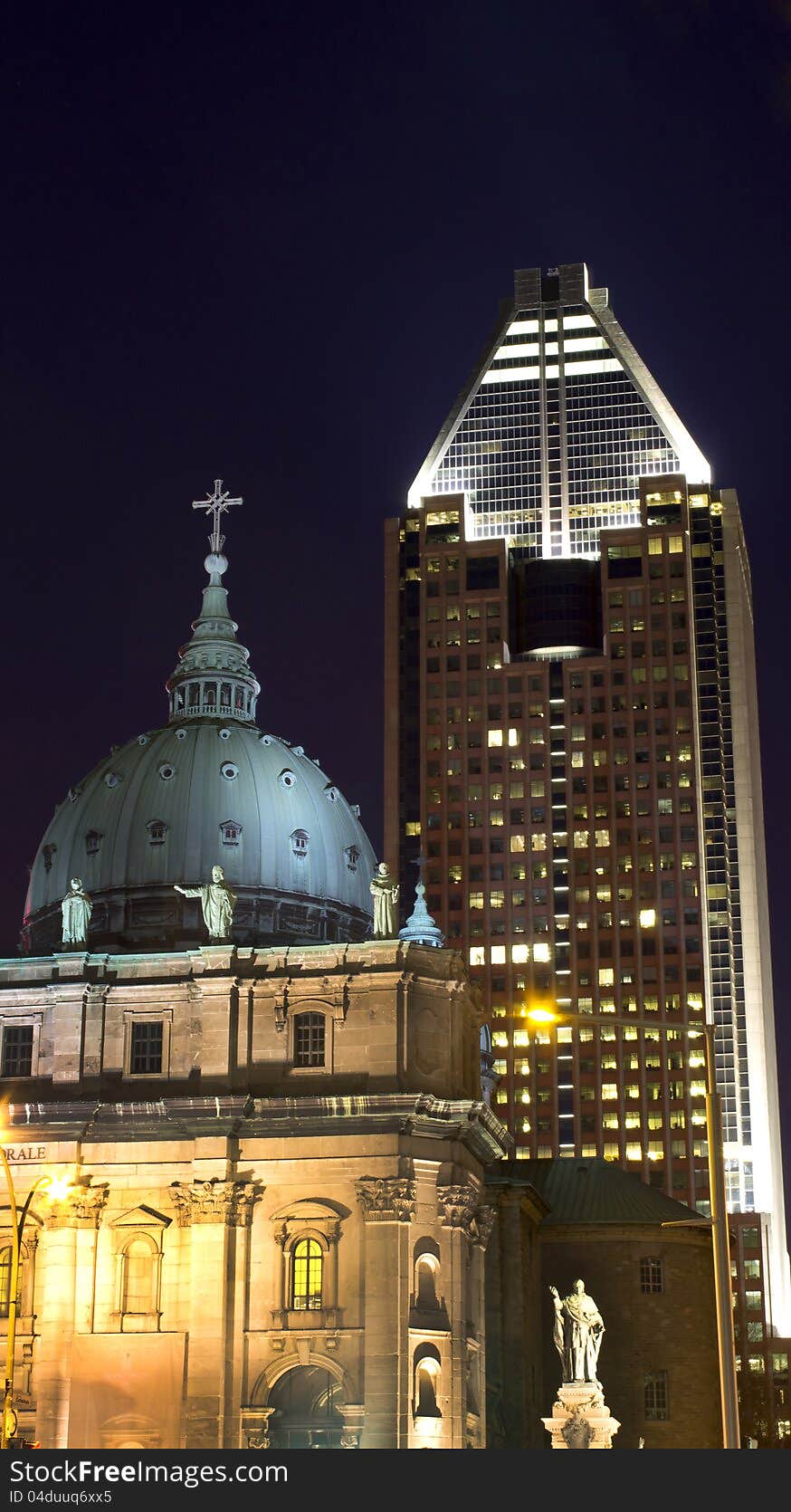 The two elements that controls politics in the world, religion and money represented here by a cathedral and an office building. The two elements that controls politics in the world, religion and money represented here by a cathedral and an office building