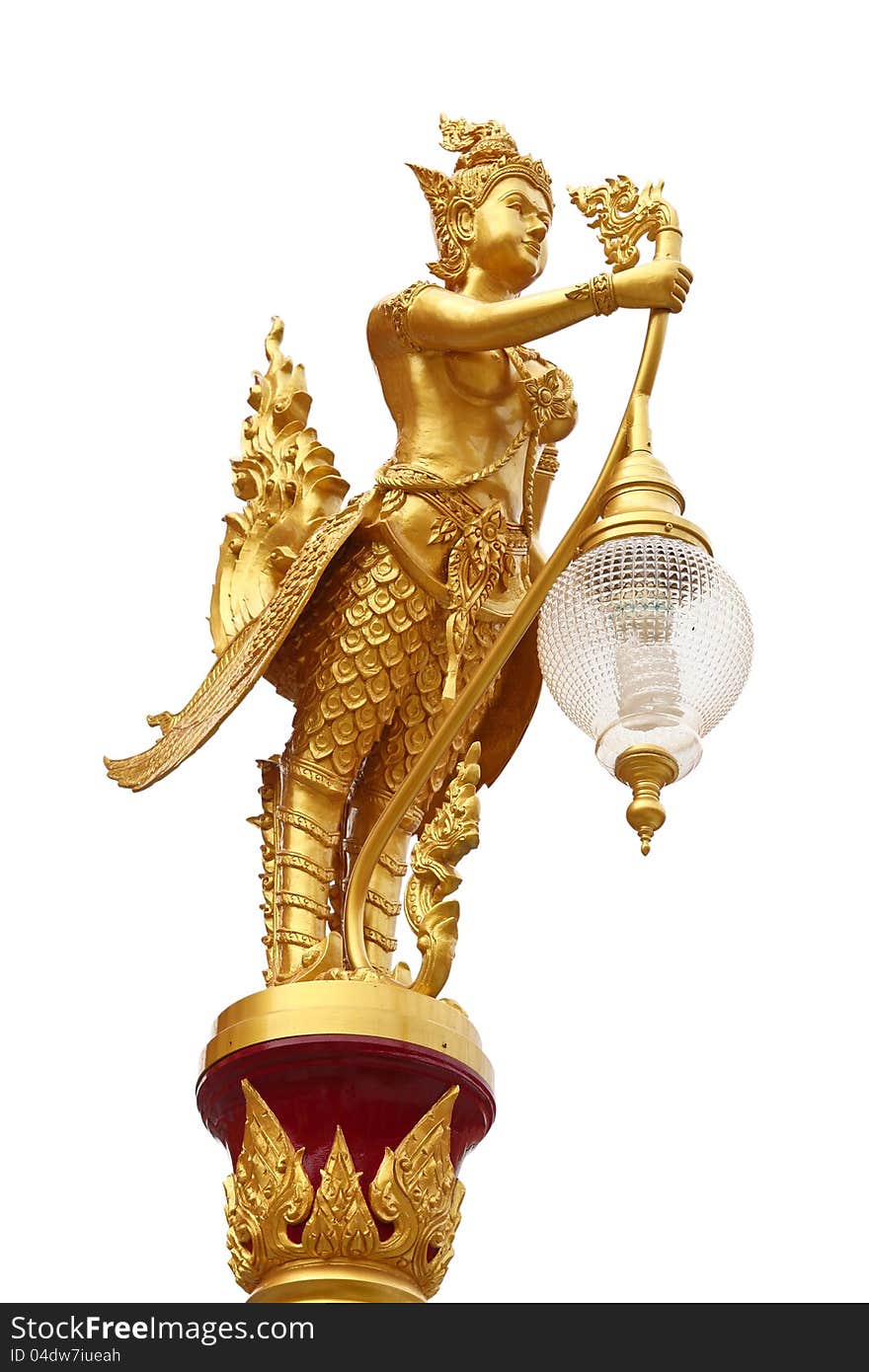 Mythical female bird called Kinnaree holding lamp in the temple with white background, Thailand. This image contain clipping path