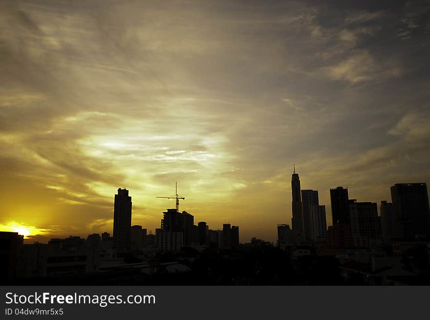 Early morning sky in Bangkok with towers in silhouette. Early morning sky in Bangkok with towers in silhouette