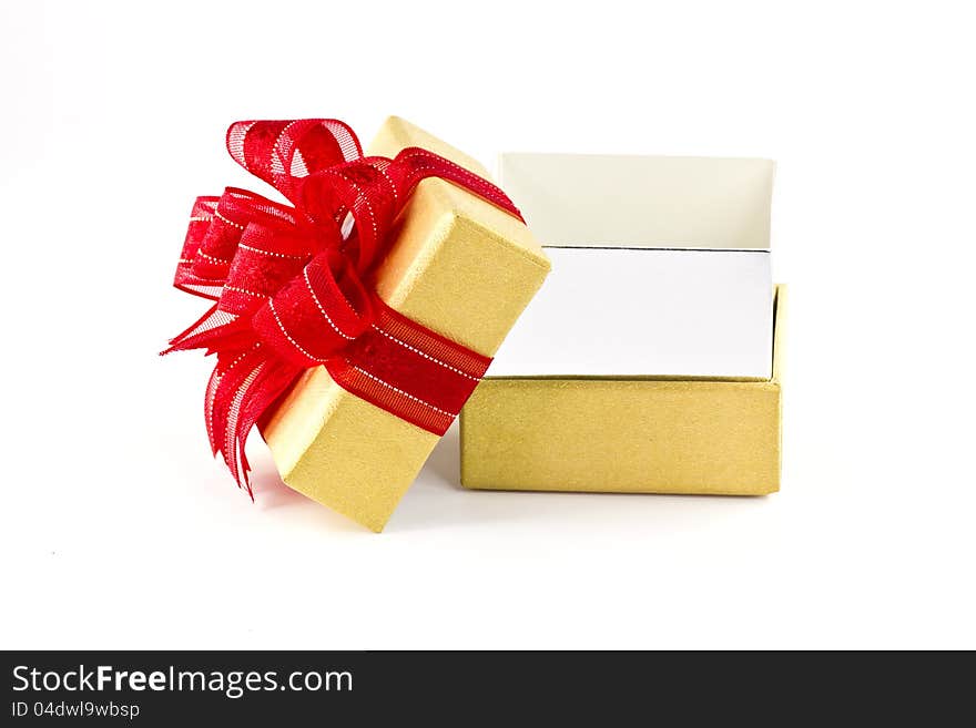 Opened gift box and red ribbon