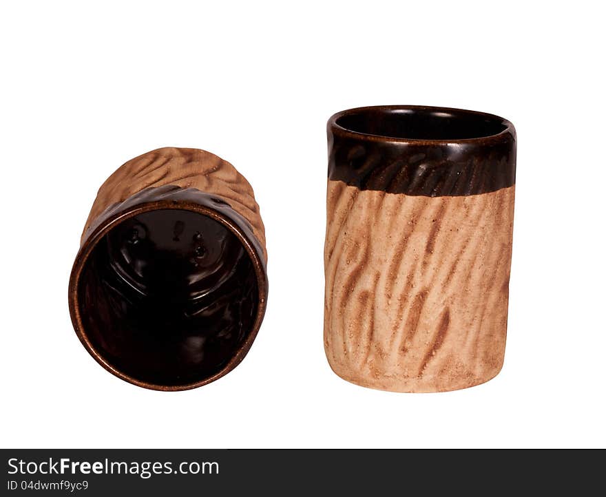 Two small ceramic cups isolated