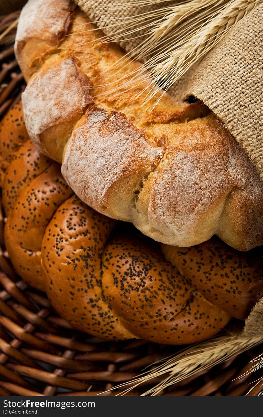 Fresh tasty bread (kalatches) close up. Homemade. Rural still life. Fresh tasty bread (kalatches) close up. Homemade. Rural still life.